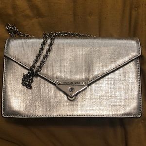 Michael Kors metallic silver evening clutch with chain strap